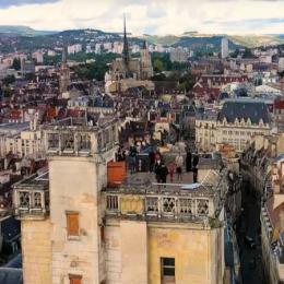 Photo aérienne de la ville de Dijon qui donne une vue d’ensemble sur la ville. En arrière-plan on y voit la cathédrale. 